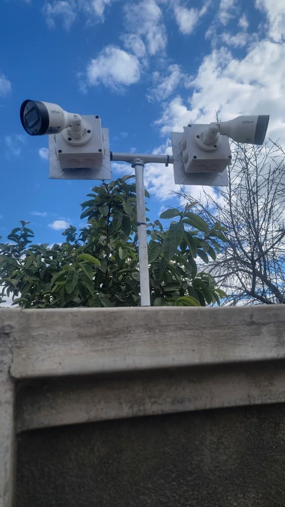 Dual bullet CCTV cameras on pole mount